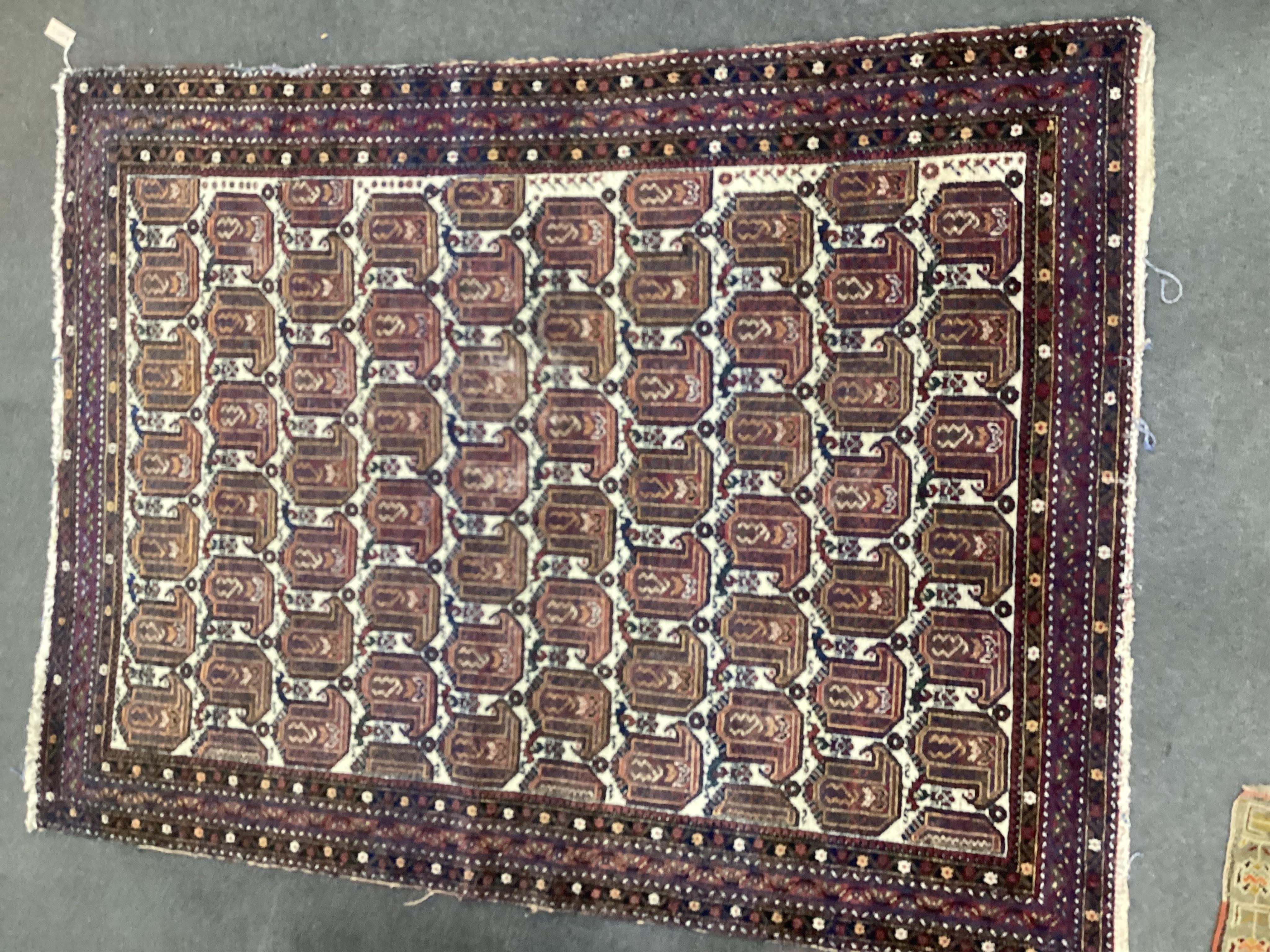An Afshar ivory ground rug, 200 x 156cm. Condition - fair